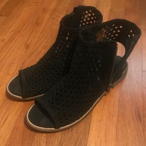 Black leather perforated sandal.